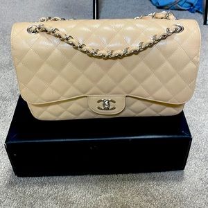 Chanel authentic double flap jumbo bag. Silver hardware beige Clair